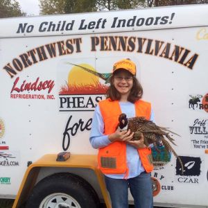 Lindsey's first rooster!